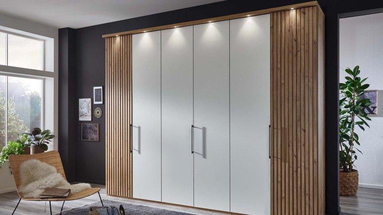View Texas <p>Texas, a VIP Wiemann wardrobe range blending the modern combination of wood and high gloss fixtures and doors. An unbeatable level of storage and organisation waiting to work in your bedroom.</p>